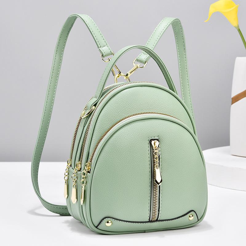 Malá taška Módní korejská verze Trendy Malý batoh Simple Atmosphere Jedno rameno Crossbody Malá kulatá taška Dvojité rameno Dámská taška