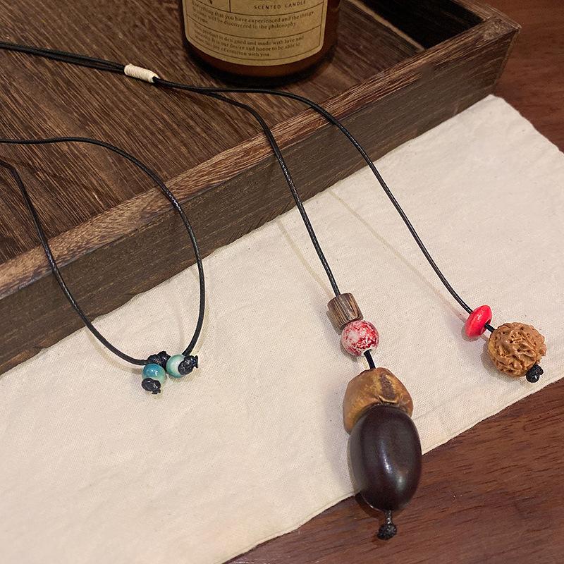 Autumn and winter retro pine nut woven necklace women's retro ethnic style fashion long sweater chain design sense