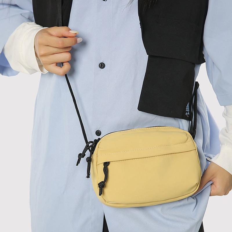 New casual sports messenger bag men's and women's niche nylon shoulder bag light, simple and fashionable mobile phone bag