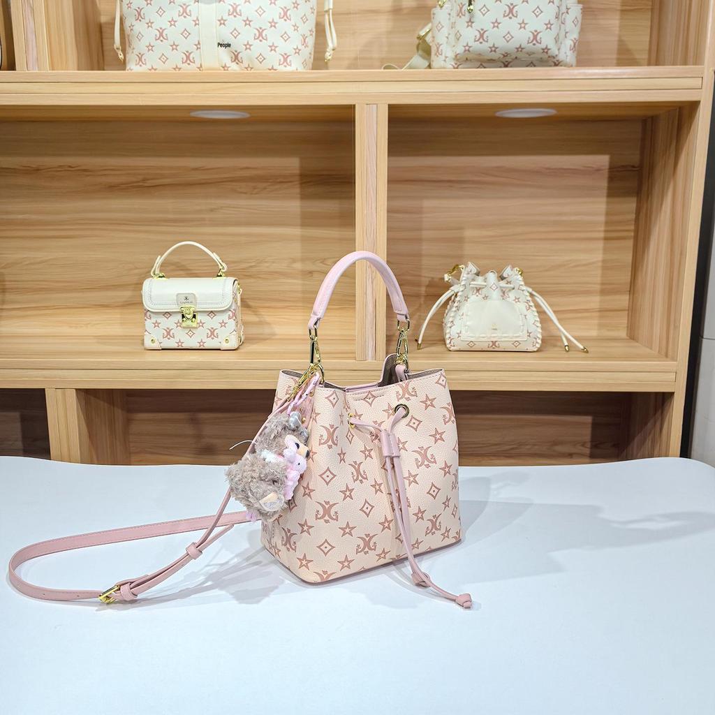 Women's Large Capacity Single Shoulder Bucket Bag with Inner Lining, Compartment Organizer, and Zippered Middle Section.