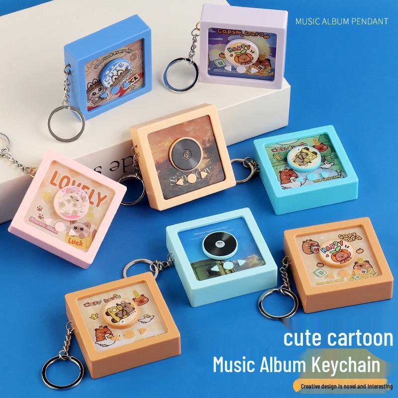 Kids' Cartoon Record Player Toy: Captures, Engages, and Delights Baby's Senses - Fun Keychain