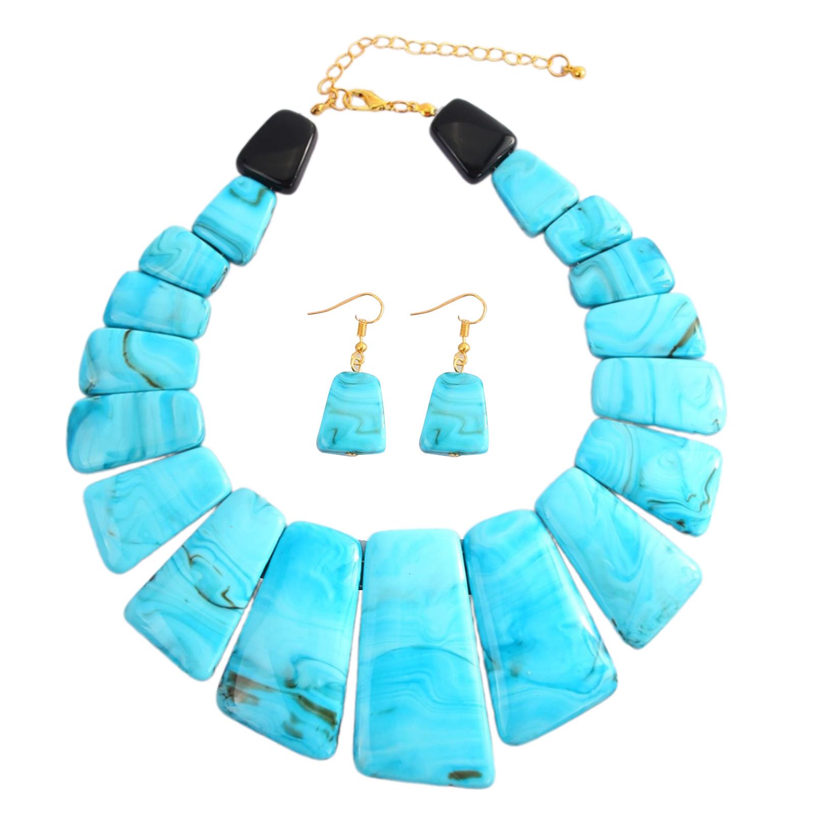 

Преувеличенный ювелирный набор с полимерным ожерельем-ключицей и серьгами-подвесками. Стильная шейная цепочка и серьги для женщин 1