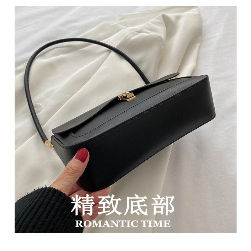 Autumn and winter women's bags fashion niche single shoulder armpit bags irregular lock texture popular women's bags