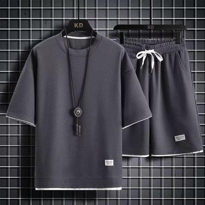 Ensemble de sport d'été en tricot gaufré pour homme: Short ample tendance et haut à manches courtes