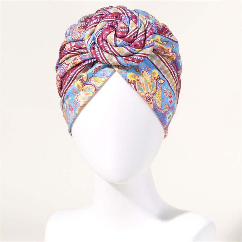 Neuer afrikanischer Druck Plissierter Turban Blumenmütze Vorgebunden Vorderknoten Elastisches Stirnband Elegant Damen Chemo Kappe Bandana Kopfbedeckung