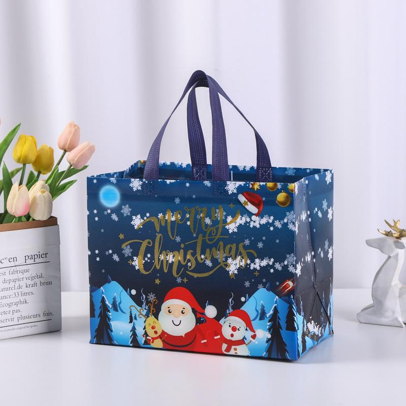 1pcs Christmas Gift Bag Santa Claus Non-woven Candy Gift Packaging Tote Bag Christmas Party Supplies Happy New Year