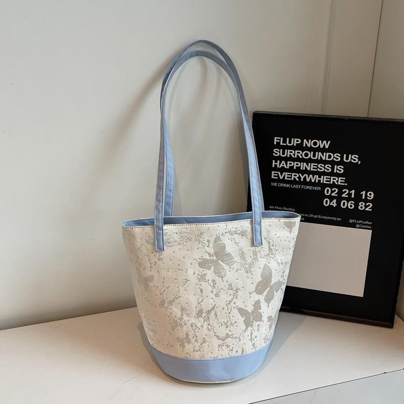 Summer contrast niche butterfly bucket bag 2025 summer new fashion simple foreign style underarm shoulder bag