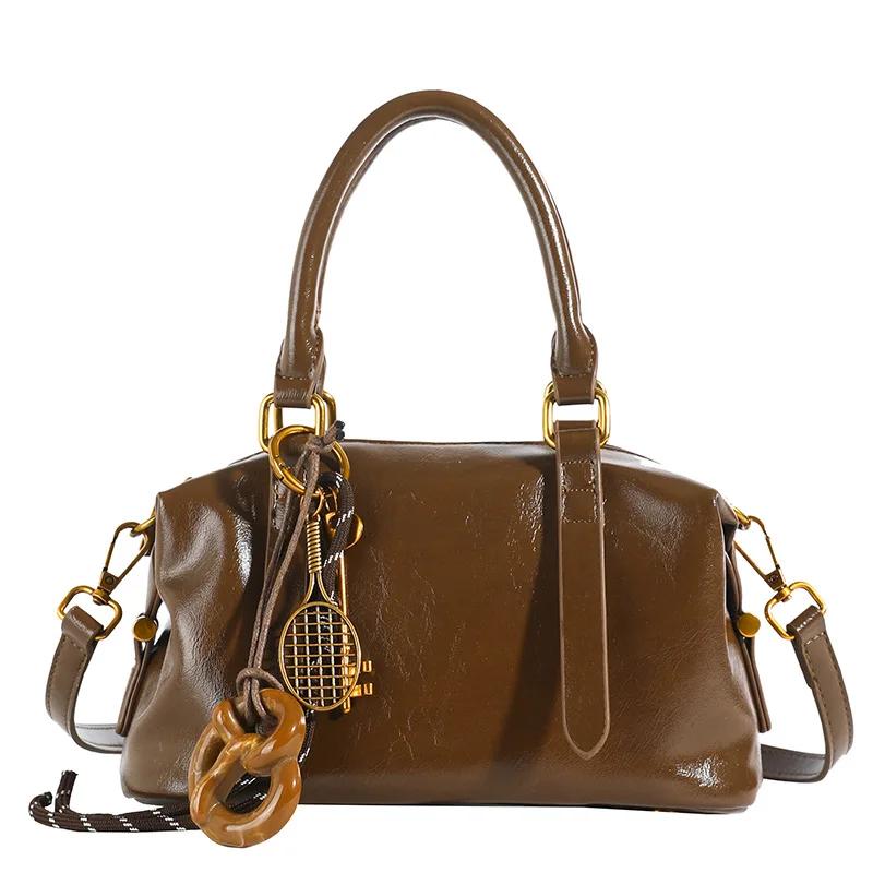 

2024 Новая сумка-подушка Boston Ретро Сумка через плечо Универсальная Сумка через плечо Женская коричневый