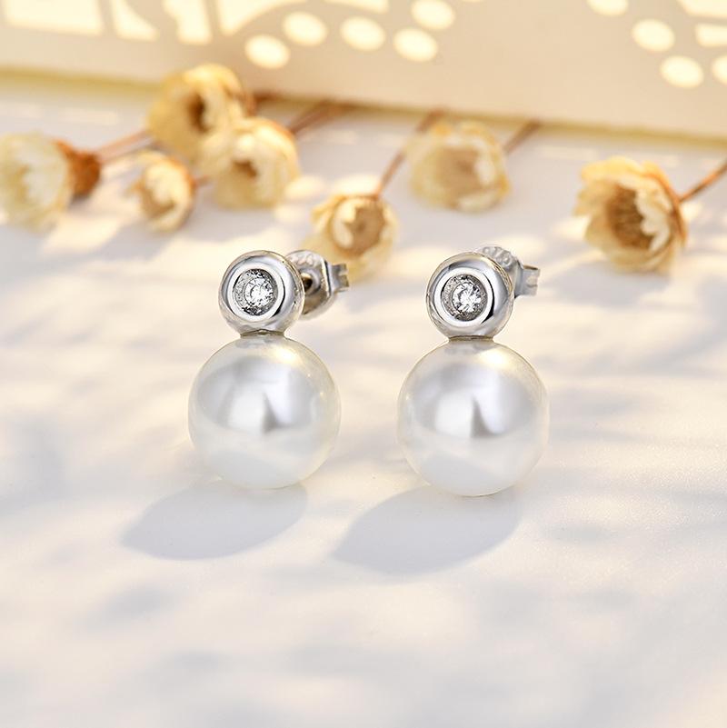 

Новый продукт Серьги с жемчугом для женщин Круглые серьги Простые нишевые Высококачественные темпераментные модные новые аксессуары