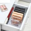 Scatola portaoggetti per palette ombretti da scrivania Divisorio per cassetti trucco Rastrelliera portaoggetti per trucco Scatola espositiva Scaffale per fard e cosmetici in plastica a 7 scomparti
