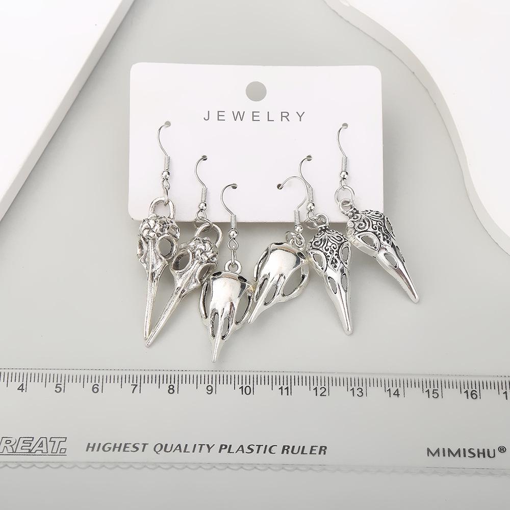 

Exclusive Antique Silver Bird Head Halloween Earrings
