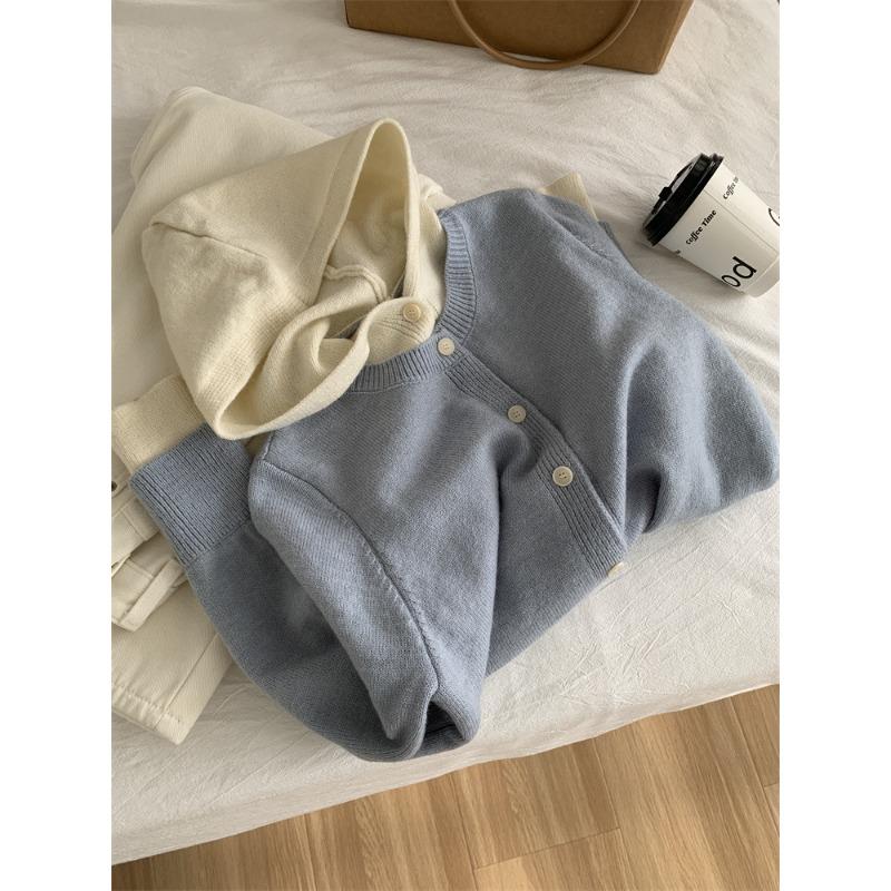 

Macaron contrasting color hooded knitted cardigan women s design sense fake two-piece sweater jacket spring and autumn loose versatile top one size fits all синій