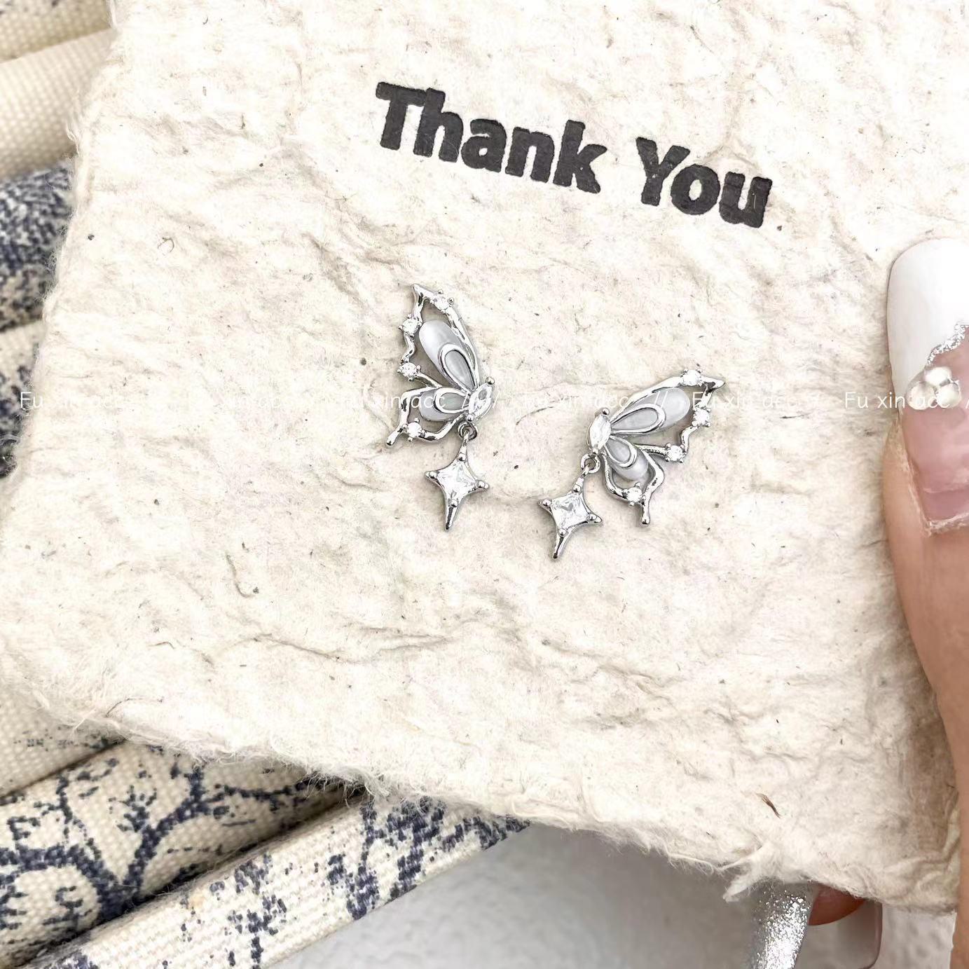 

Серьги Весенняя Фея Бабочка Кошачий Глаз: Изысканный дизайн со звездой из циркона, модный и универсальный. E0431