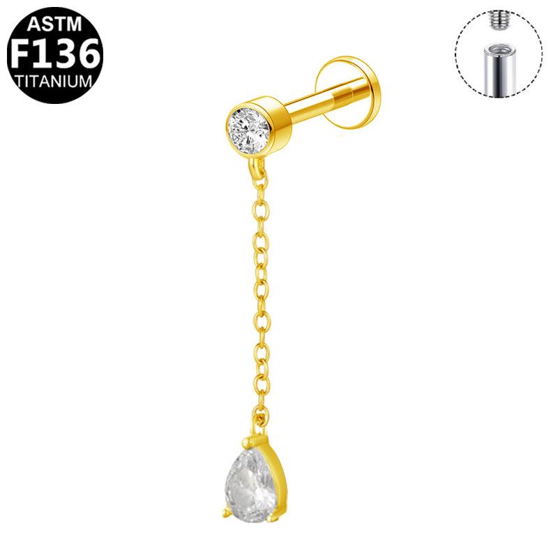 G23 Titanium Cartilage Stud with Zircon Chain and Lightning-Inlaid Titanium Lip Stud.