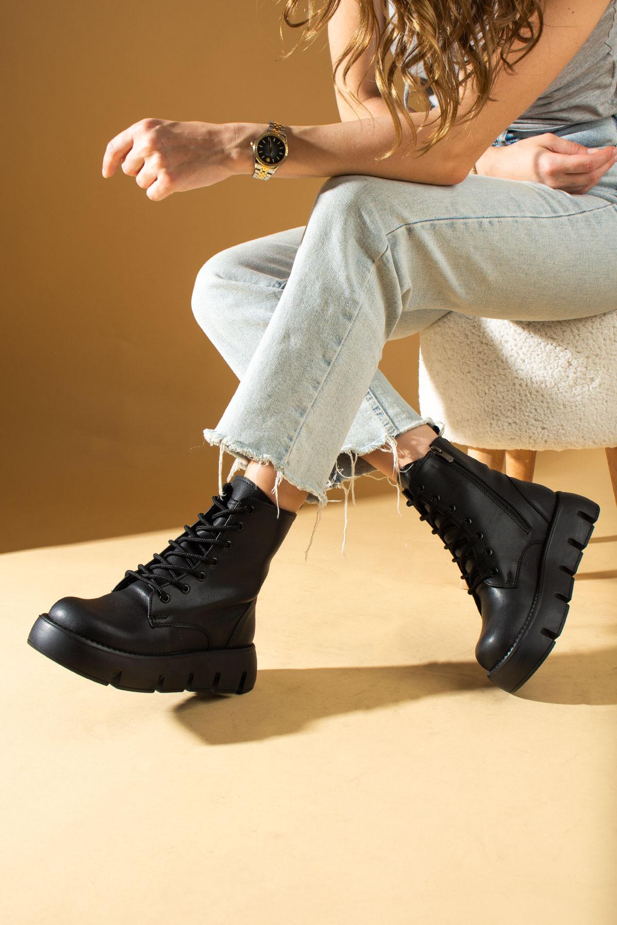 

Женские ботинки на молнии на высокой подошве 54-641-23 38 чёрный