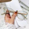 Cat's eye stainless steel floral pattern gold leg glasses frame versatile plain color-changing gray sunglasses can be matched with myopia glasses