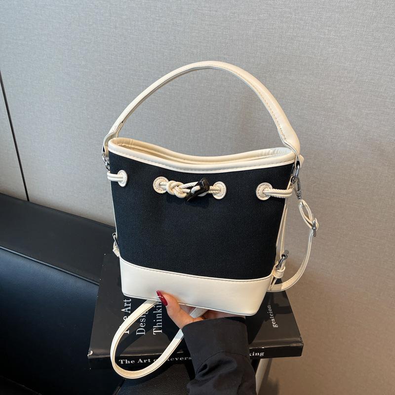 Premium sense simple retro bucket bag women's 2025 summer new messenger bag casual portable shoulder bag