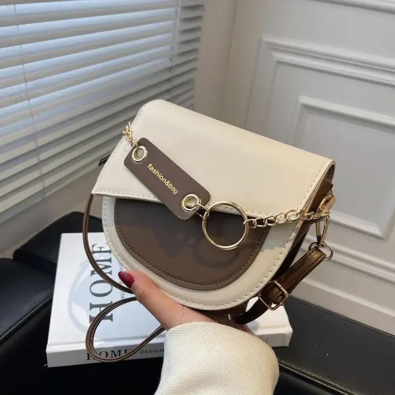 Dámské sedlové tašky crossbody tašky nové messenger tašky řetízkové klopové tašky přes rameno jednobarevná designová luxusní crossbody taška