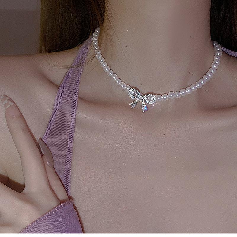

Бриллиантовое колье-бант с жемчугом, чокер с высоким чувством стиля, шейная цепочка, колье-цепочка на ключицу в нишевом стиле легкой роскоши для платья