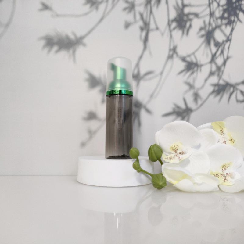 Available 60ml Transparent Black Foam Mousse Bottle for Face Wash and Travel-friendly Cosmetic Packaging.