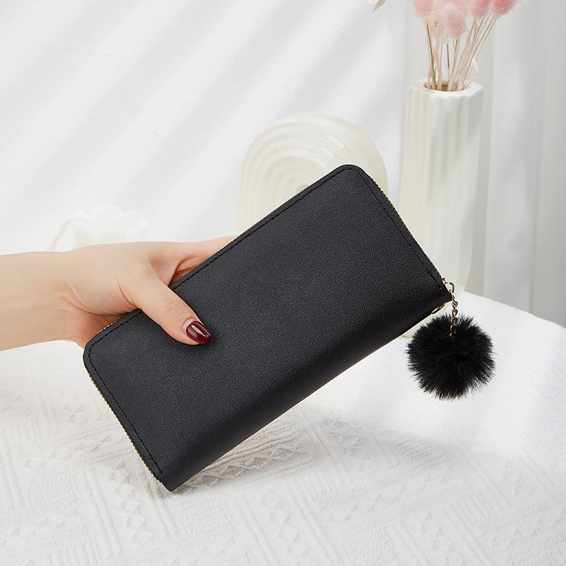 Spring and summer new women's wallet indentation medium and long clutch bag trendy love hairball change mobile phone bag