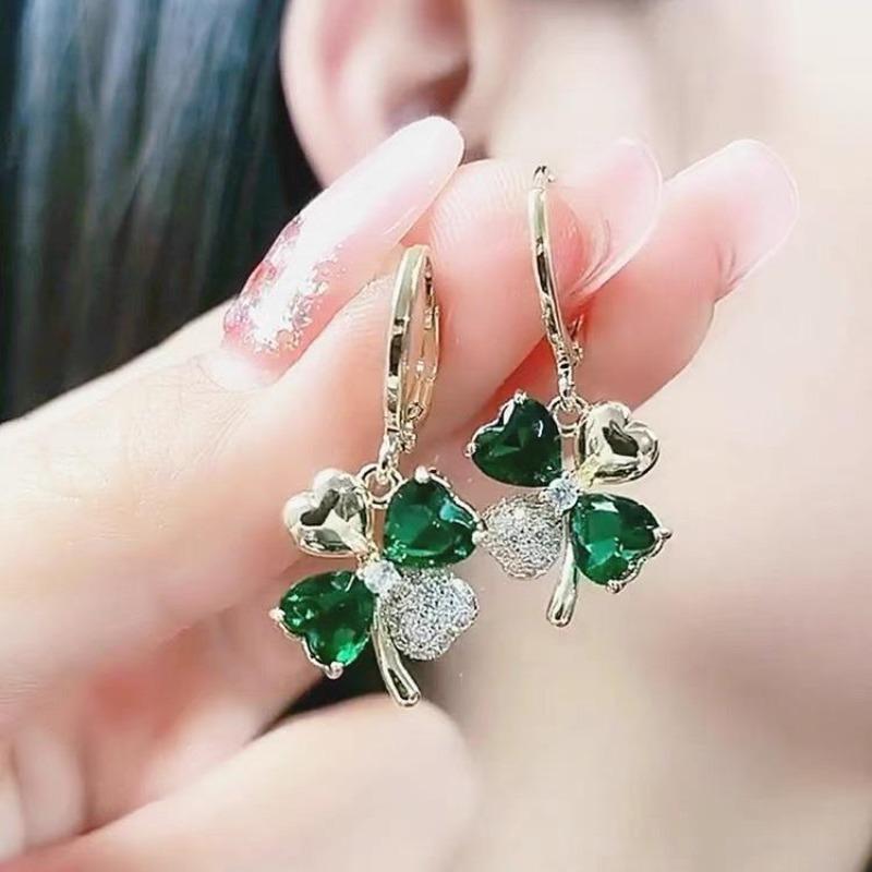 Elegant Green Earrings with Micro-inlays in The Form of A Four-leaf Clover Are A Trendy… More