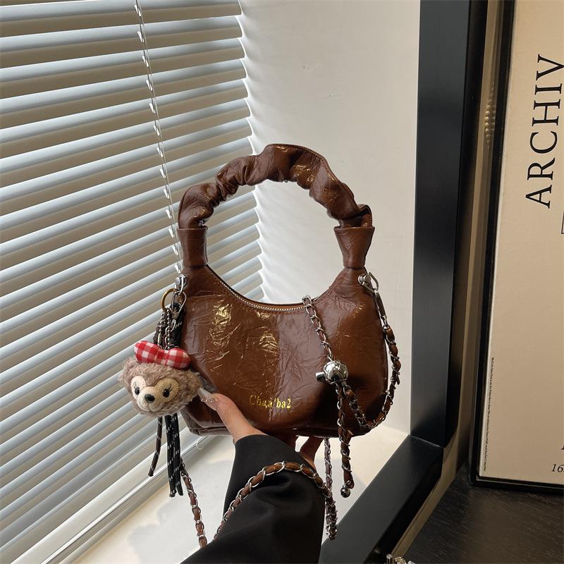 

Premium leather women s bag 2025 new versatile retro pleated commuter handbag fashion shoulder messenger bag women no pendant коричневий