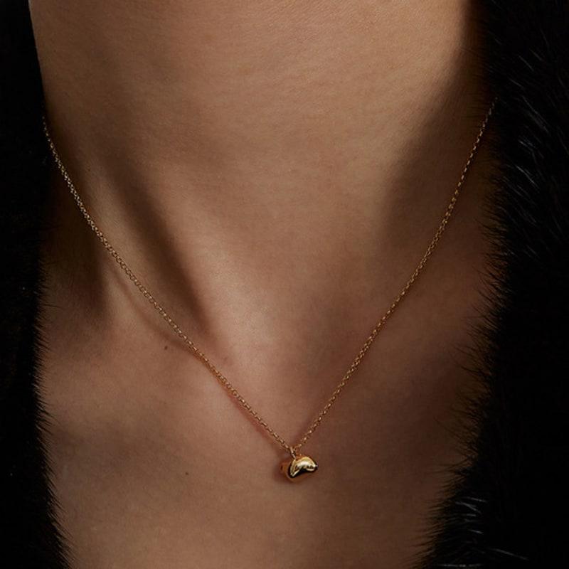 Unsichtbares Collage KLEINES ZITRONENKURVE COLLIER_GOLD