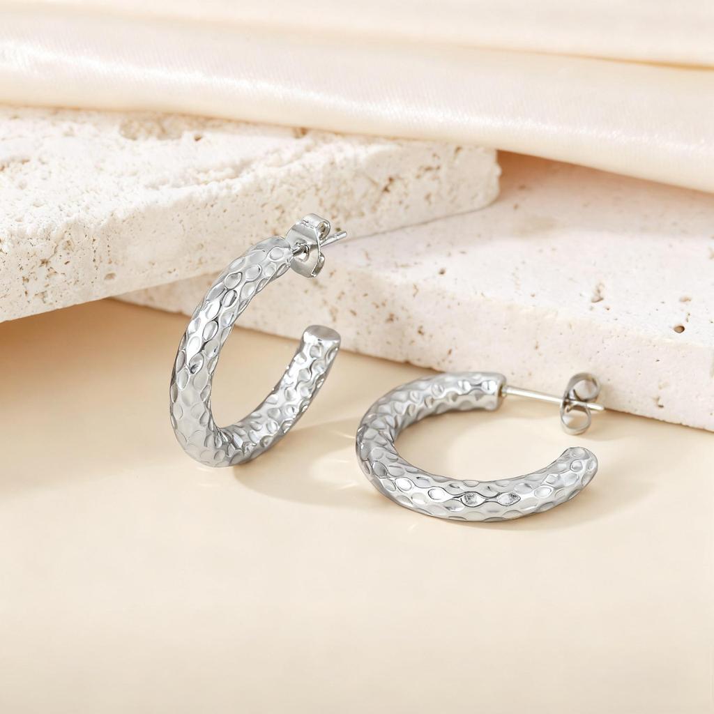 Orecchini a Cerchio Geometrici Intrecciati Europei e Americani in Acciaio al Titanio - Design Elegante e Unico per Donna