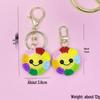 Bunte Sonnenblumen-Smiley-Gesicht Schlüsselanhänger & Handgefertigter Taschenanhänger - Ohrhörerhüllen-Dekoration für Damen & Kindertag Geschenk