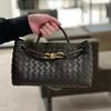 Niche Design Spring New Metal Rope Buckle Leather Woven Tote Bag Single Shoulder Portable Large Capacity Retro Women's Bag