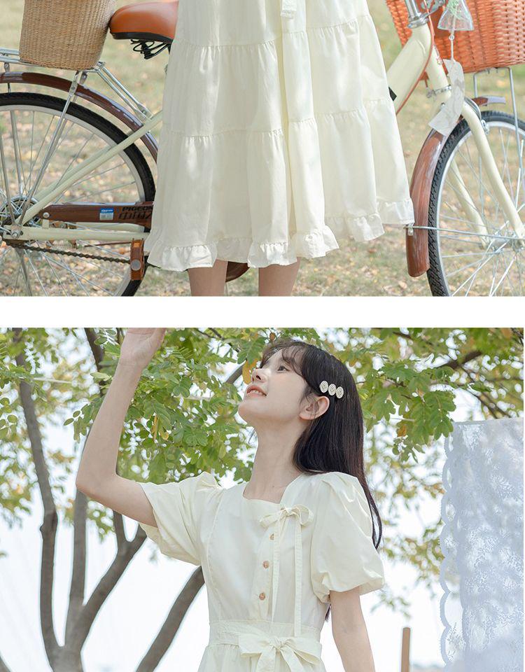 Retro Sommerkleid mit Puffärmeln, Schleifenbändern und taillierter Taille