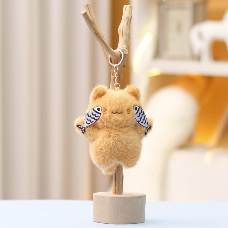 

Plush Shy Cat Holding Fish Toy Pendant With Soft Short Pile For Kids And Collectors