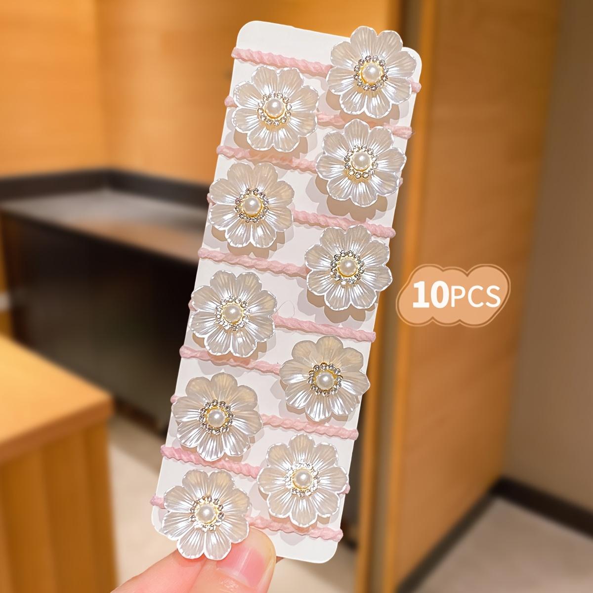 

10pcs cute floral hair ties with 3D flowers, ideal gift for girls, perfect for daily and outing hairstyles.
