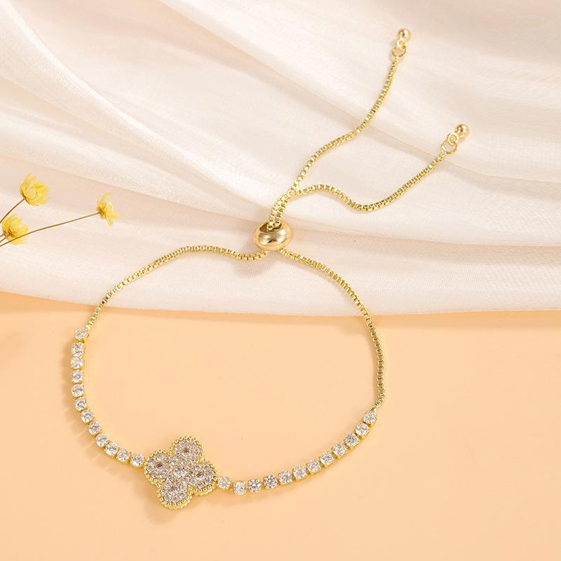 Copper inlaid master bracelet can be stretched freely Korean version popular micro-inlaid zircon four-leaf clover pendant wholesale accessories