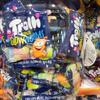 Trolli Minhocas Glow Ácidas Mini Pacotes de Gomas 10g x 100 Pacotes
