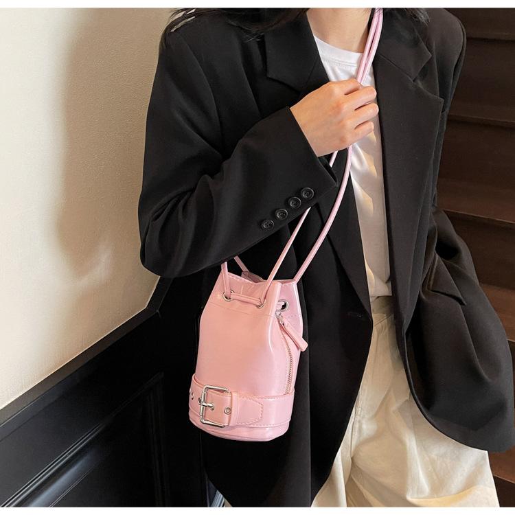 Nowa niszowa torba wiaderko, torba gwiazda ze sznurkiem, słodka i cool osobowość, suwak, listonoszka cross-body, codzienna torba na ramię