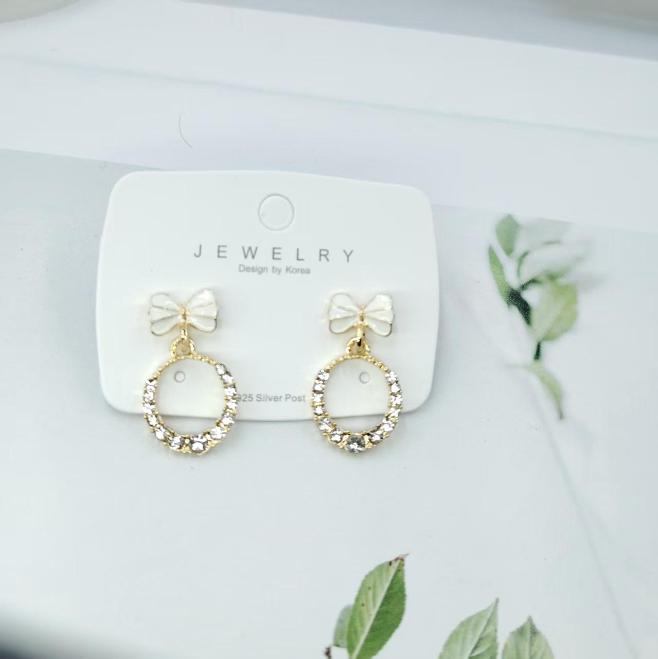 High-End Rhinestone Bow Earrings: Elegant, Versatile, and Slimming Hollow Round Design for Women