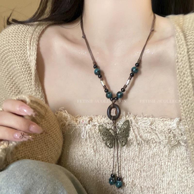 Bohemian Ethnic Style Long Bow Metal Necklace with Vintage Distressed Pendant (2025)