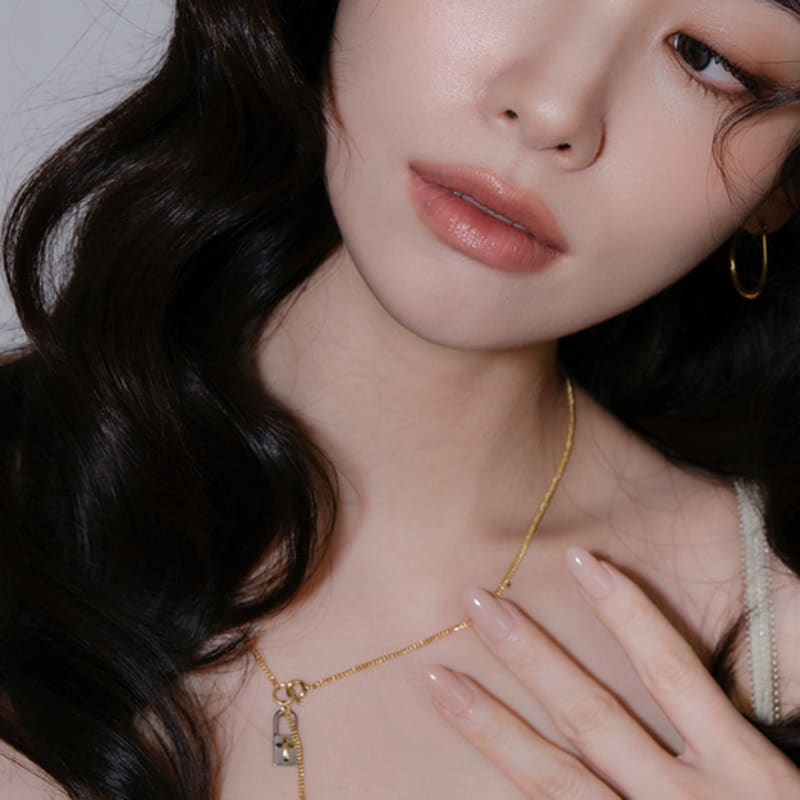 reve lock & cross two-tone drop necklace