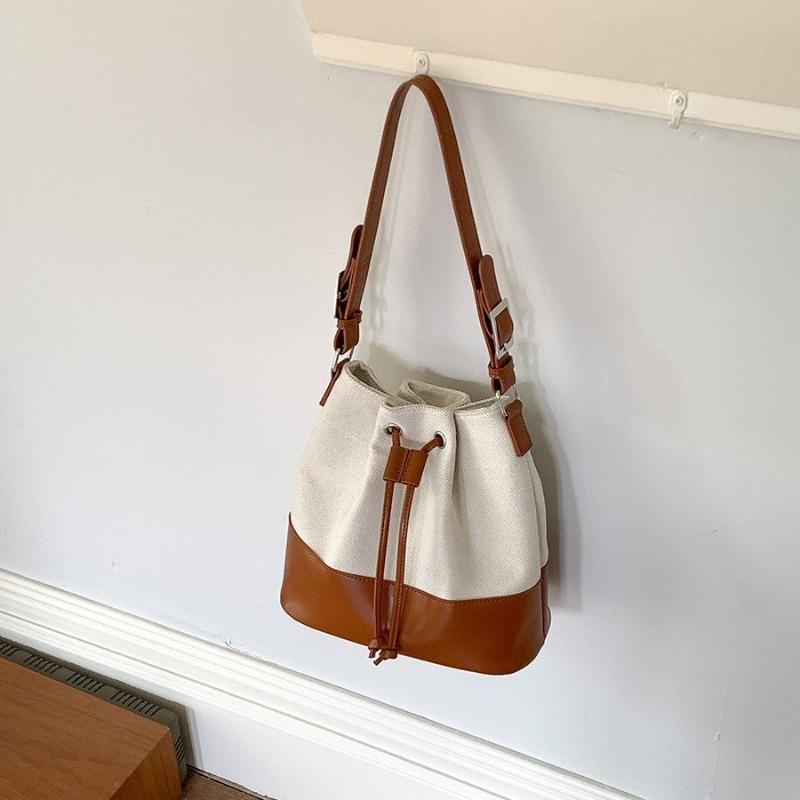 New bucket bag women's drawstring pleated bag niche splicing design women's shoulder bag canvas
