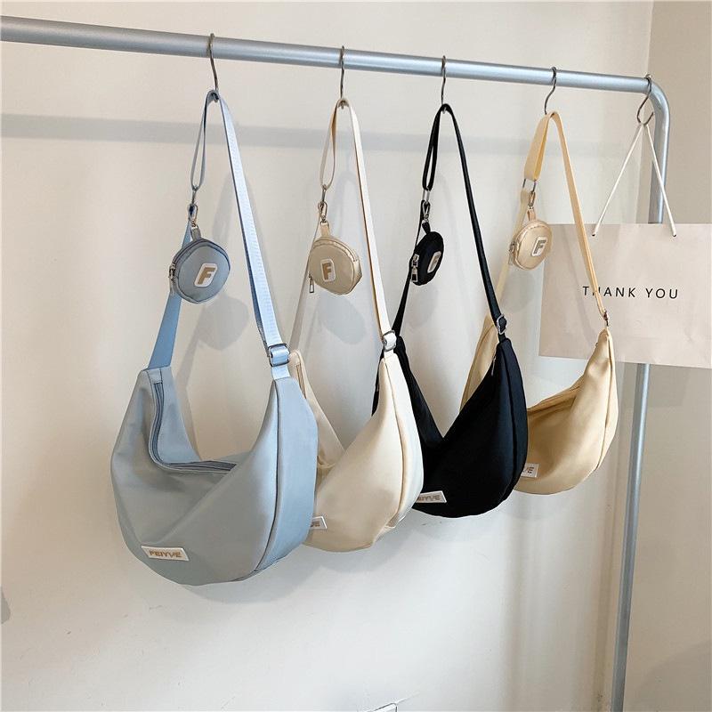 IELGY nylon dumpling bag, Japanese versatile messenger bag, casual large-capacity canvas class shoulder commuter bag