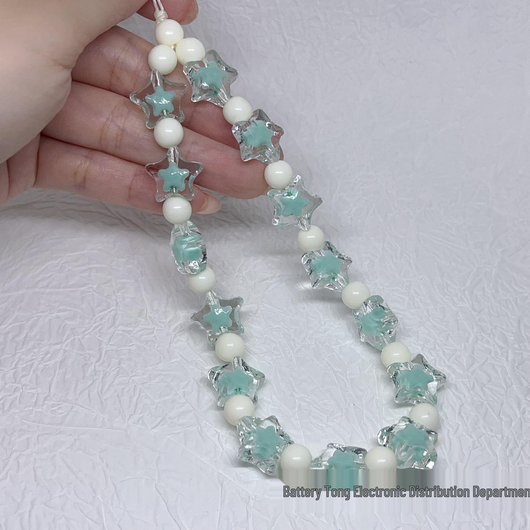 

Ланцюжок для телефону з бісерними зірками: Стильний кулон своїми руками, універсальний декор