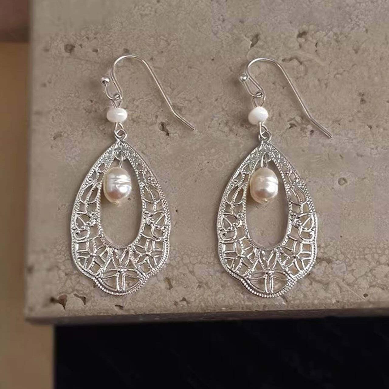 Ethnic style handmade design feeling water drop hollow literary temperament new earrings earrings earclip jewelry
