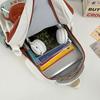 Schoolbag Korean version contrasting color splicing backpack 1011 new fashion and light travel backpack casual tooling style school bag