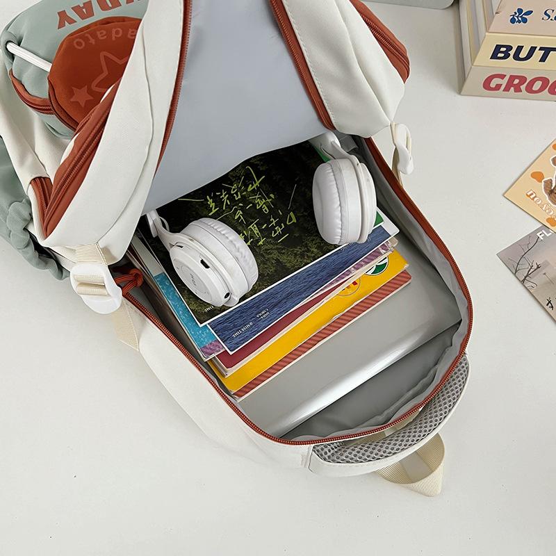 Schoolbag Korean version contrasting color splicing backpack 1011 new fashion and light travel backpack casual tooling style school bag