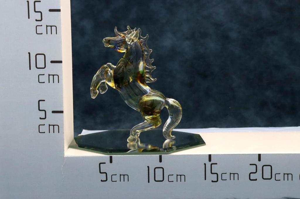 Glass Square Good Luck Charm: A Large, Standing Glass Horse Symbolizing Vitality, Drive, and Energy To Enhance Success. Available In Three Colors, 15c