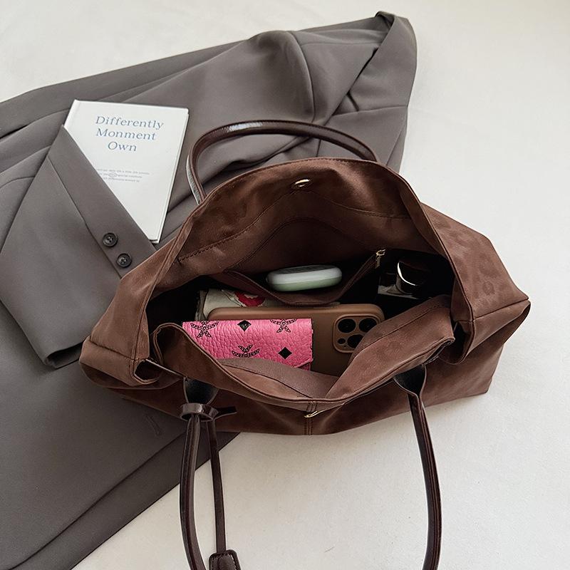 Lässige und modische Unterarmtasche, vielseitige und retro Umhängetasche