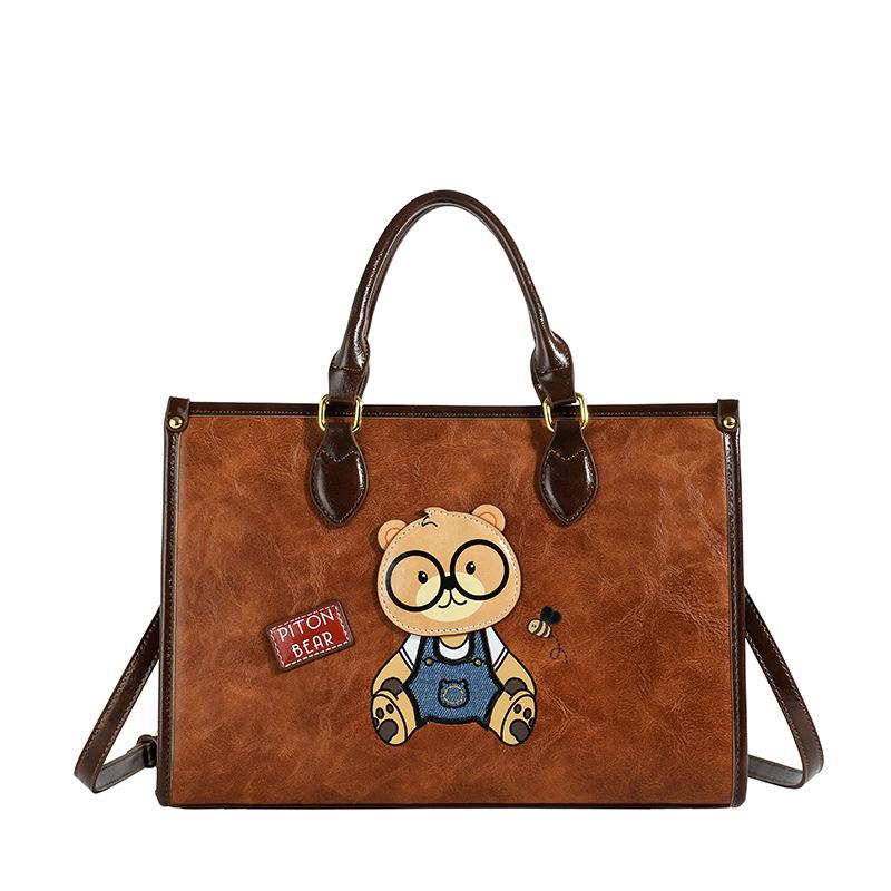 

North bag source factory Korean version of the trend hand-held travel shopping commuting large capacity shoulder messenger bag women коричневий