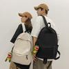 School bag college students solid color simple junior high school students Korean version daily large-capacity street backpack